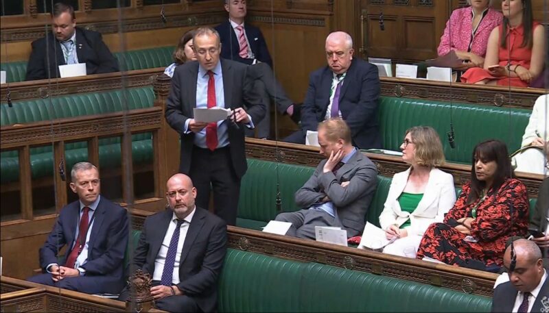 Speaking in Parliament.