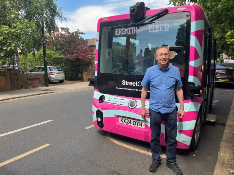 Enjoying a ride on an electric shuttle pod in Barnes. 